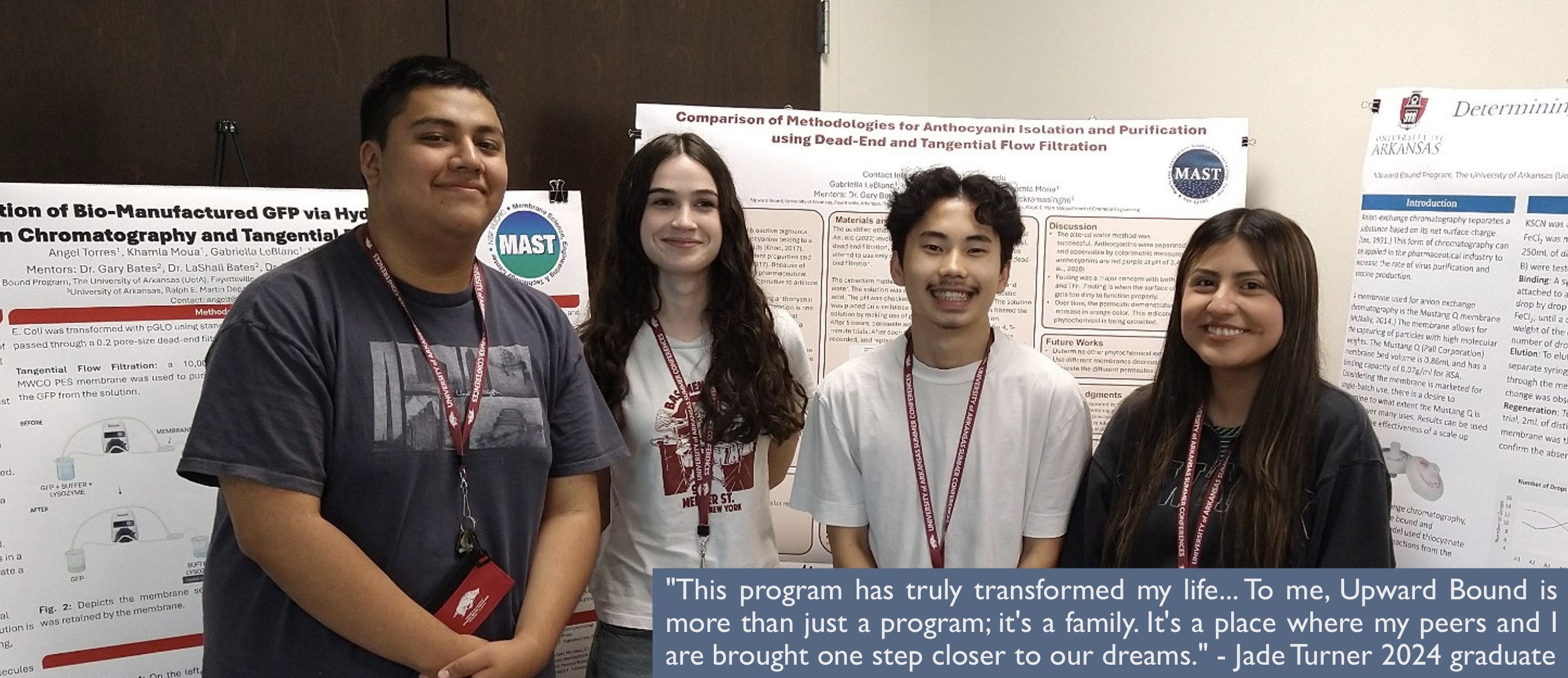 Image of UB Students standing in front of a poster display.